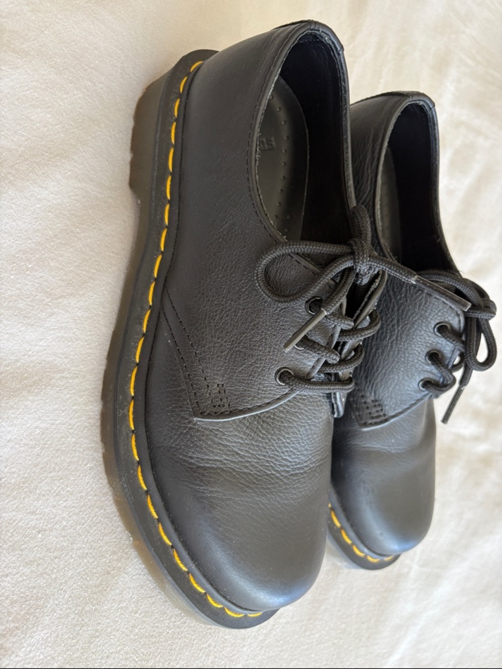 Dr. Martens Black Leather Lace-Up Women’s shoe with Yellow Stitch Detailing